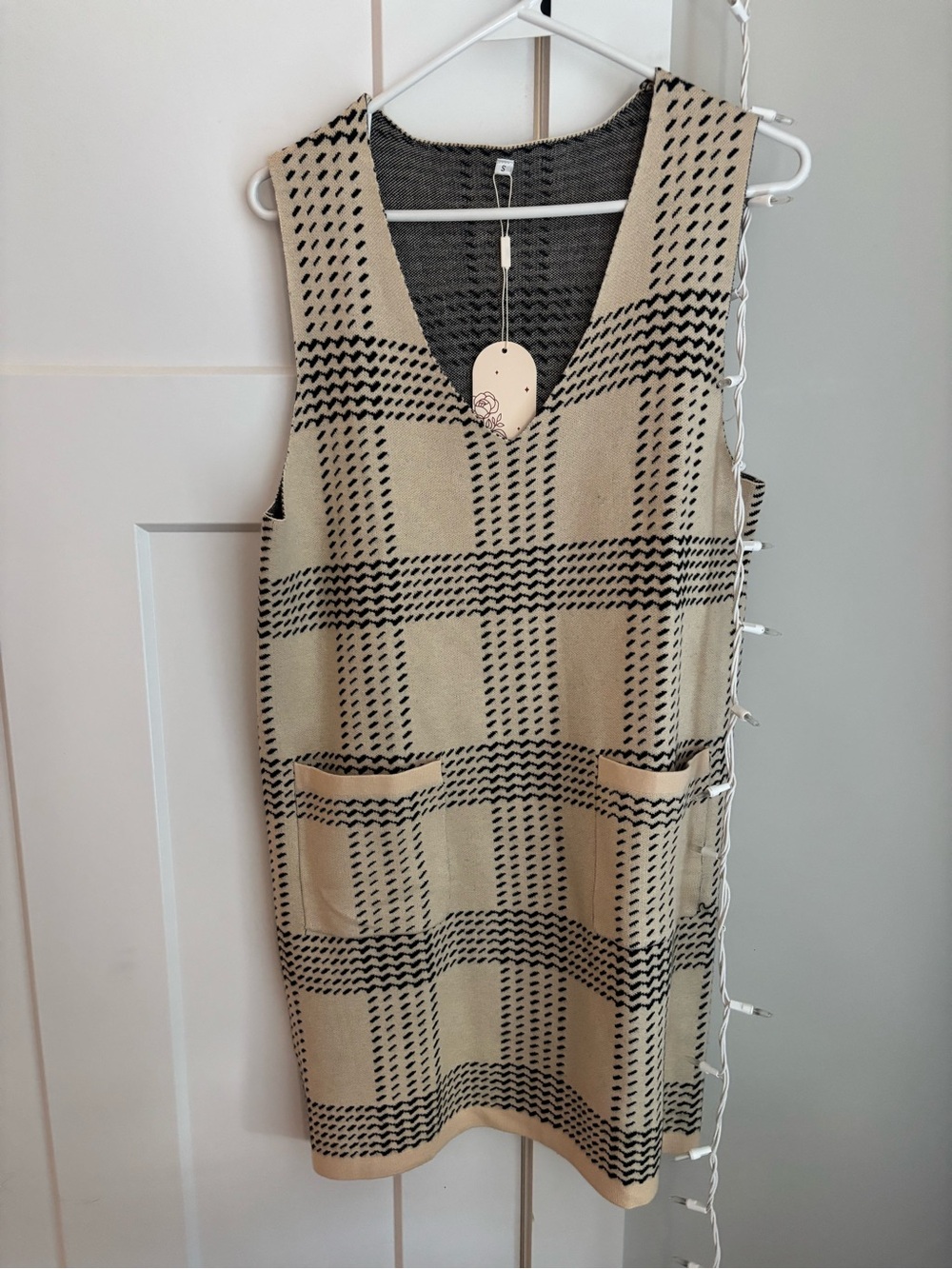 Amazon Sleeveless V-Neck Plaid Knit Mini Dress in Cream and Black